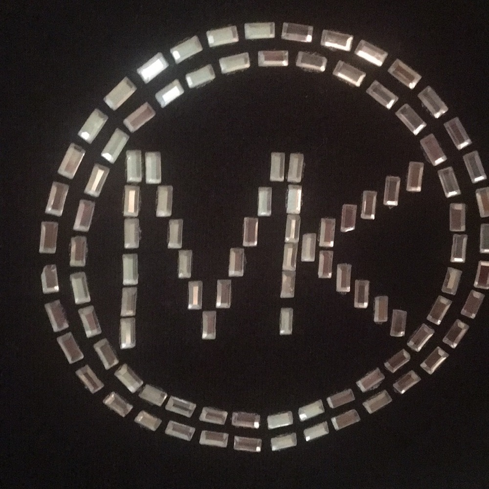 NWT Michael Kors Size M black top with 3/4 sleeves